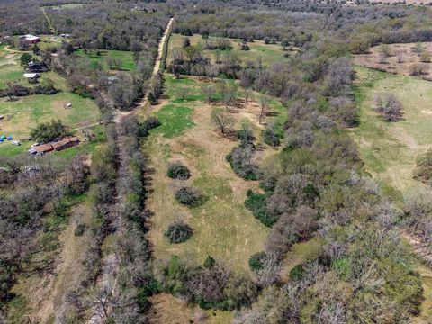 Fabulous property slightly less than 28 acres. Freshly cleared and mowed. Several topography levels. 1500 feet of road frontage. There are two elevated and private homesite areas, each with 2 large private meadows. Fully fenced with electric and wate...