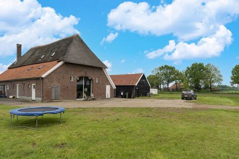 Enjoy plenty of peace and nature from this comfortable and historic holiday home in the province of Gelderland. It features a fine location in a wooded area and comfortably accommodates several families. This holiday home is a combination of the fron...