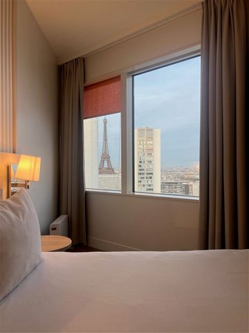 Summary One bedroom apartment with views of the Eiffel tower and city for sale on the 20th floor of the Adagio Hotel composed of an entrance with a 24-hour reception, fitness centre and indoor swimming pool. It comes with a living room, an equipped k...