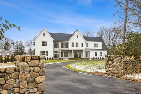 A spectacular, park-like acre in a prime Greens Farms location is the setting for this incomparable new construction SIGNATURE home w/pool by noted builder SIR Development. An artisan stone wall suitable for entry gates & a gracious circular driveway...