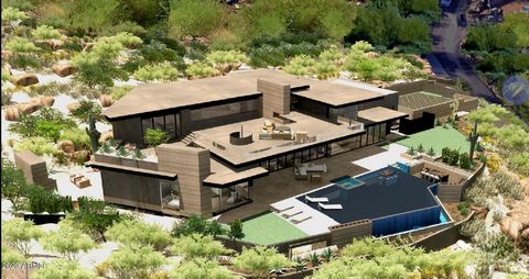 Award-Winning Developer ARCO Custom Homes brings yet another Modern/Transitional Architectural Masterpiece to Camelback Mountain. This privately gated estate features soaring 24-foot ceilings, retractable floor to ceiling custom glass walls and massi...
