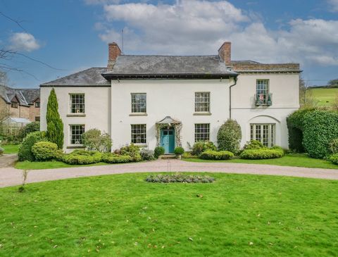 This handsome former parsonage with 19 acres of land, a charming two-bedroom holiday cottage and five stables is set in the beautiful Herefordshire countryside, close to the England/Wales border and to the market town of Monmouth. Ideal for a family ...