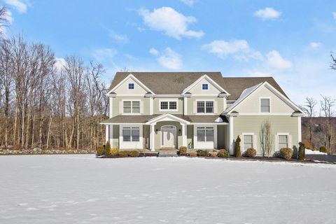 The perfect marriage of beautiful style and modern technology, this home has it all - sweeping views for miles and miles, a state of the art geothermal heating and cooling system, and the ideal location! This home sits in a recently completed private...