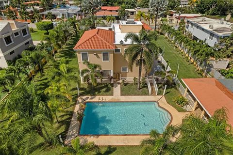 This one-of-a-kind abode spanning 5 bedrooms and 4.5 bathrooms in the most coveted neighborhood in Manati, on the north coast of the island, is a true gem. With more than 4,500 square feet of living space nestled in an extensive 2,655 square meters o...