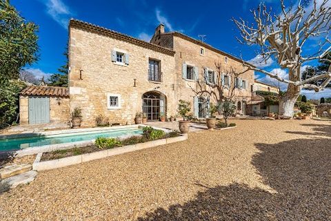 Located in the town of Paradou, just 2 minutes from Les Baux-de-Provence, this property, dating back to 1724, seamlessly blends authentic charm with modernity. This prestigious residence, spanning 2 floors above ground and a ground floor, offers a un...