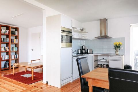 The holiday apartment is on the upper floor of a Bauhaus that was built in 1932. The holiday apartment has just been renovated. The Bauhaus holiday apartment is located on the mainland - directly on the water, with a panoramic view of the island of W...