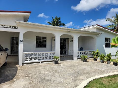 Located in Mullins. Located within the quiet residential neighbourhood of Mullins Terrace, this charming Barbadian-style bungalow sits on approximately 10,551 sq.ft of land and is fully enclosed with established gardens and mature trees. This single-...