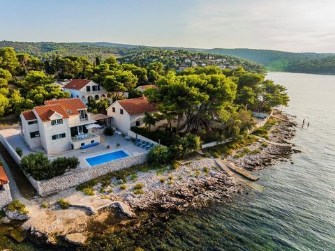 Charming villa with a swimming pool on the first line of the sea near the town of Splitska on Brac! Villa is located right on the beach!  A true pearl of Splitska! Beautiful views of the sea and of the mainland mountains! The area of ​​the villa is 1...