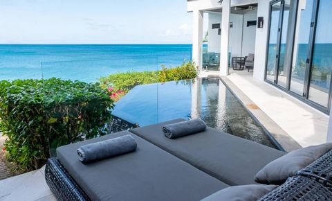 Located in Valley Church. This two bedroom villa unit enjoys magnificent views overlooking Darkwood Beach and the Caribbean Sea. The stunning views can be enjoyed from the open plan kitchen, living and dining area on the ground floor which lead out o...