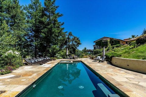 Experience luxurious Napa Valley living in this completely renovated California mission-style estate that seamlessly blends modern sophistication with classic architecture. Set on an expansive 2.5+ acres above St. Helena, this magnificent property of...