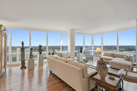 This professionally custom designed Ritz Carlton home on the 33rd floor is a 3100 SF combined apartment with large and well appointed rooms offering a perfect floor plan. Floor to ceiling windows bring in light and magnificent everchanging sunsets. L...