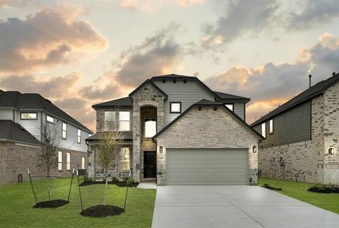 LONG LAKE NEW CONSTRUCTION - Welcome home to 18419 Windy Knoll Way located in the community of Grand Oaks and zoned to Cypress-Fairbanks ISD. This floor plan features 4 bedrooms, 2 full baths, 1 half bath, and an attached 2-car garage. You don't want...