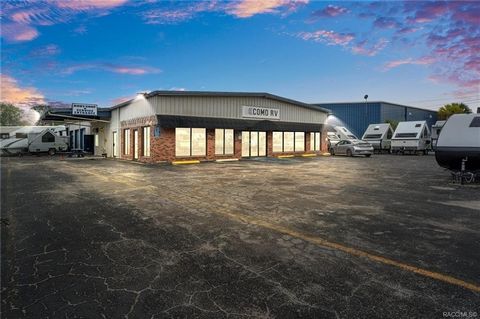Strategically positioned on the southwest corner of SR 44/W Main Street within the city limits of Historic Downtown Inverness, this property boasts over 200 feet of highway frontage and offers seamless ingress and egress from two roads. Currently occ...
