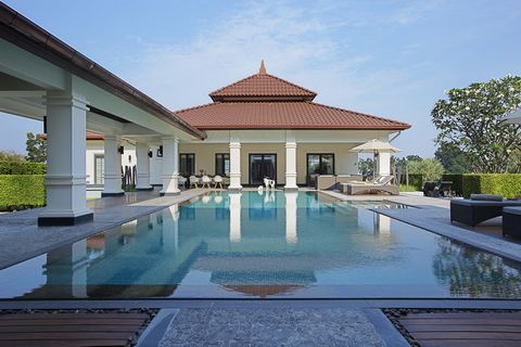 WHERE LUXURY LIVING MEETS ACTIVE LIFESTYLE ULTIMATE OUTDOOR LIVING  This villa features a living area separated from the sleeping area by a large integrated swimming pool surrounded by several terraces and a beautiful tropical garden. MODERN THAI INT...