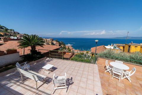 Porto Santo Stefano, Via del Sole Inside an elegant condominium in the initial part of Via del Sole, we offer an apartment with a large outdoor space overlooking the sea and a garage. The large apartment boasts a comfortable living room, kitchen, hal...