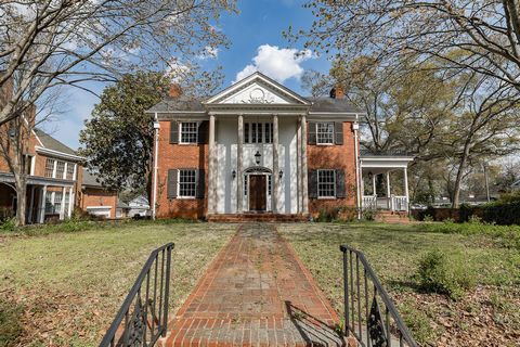 Prime walkable Five Points Athens, GA location. Currently used as residential home. Permitted uses include, among many others; office, bed & breakfast, medical, & office downstairs with living above. Stately Georgian style 2 level red brick home with...