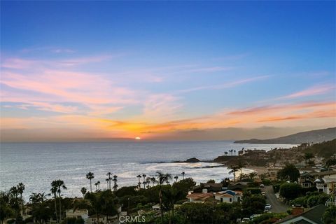 Experience luxury coastal living at its finest with captivating Panoramic Ocean and Catalina Sunset Views from the moment you walk through the door. Built by famous California architect J. Carson Bowler, this custom home sits on a large street-to-str...