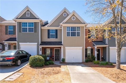 This fee simple townhome welcomes its new owner with freshly painted walls in a tasteful neutral agreeable grey. Situated in the most desirable location within Woodstock, and boasting low HOA fees, this property is a true hidden gem. Featuring 2 bedr...