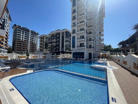 Your Dream Living Space Is Waiting For You! ALANYA MAHMUTLAR LUXURY RESIDENCE Meet our 1+1, 50 m² apartment, which combines comfort and elegance, just 900 meters from the sea. We offer a home where you can enjoy every moment with modern American cuis...