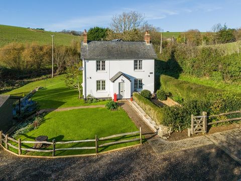 Set within three acres of woodland and surrounded by countryside, this 19th century farmhouse has been completely renovated by the current owners to an incredibly high standard, resulting in a remarkable, three-bedroom home enveloped in the beautiful...