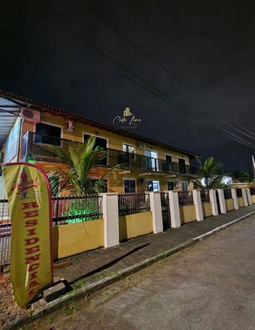 The Residencial Estrela Dourada located at Ponto do Papagaio, Ens. Brito, Palhoça sc, is approximately 200 meters from the beach and has 1 and 2 bedroom apartments, well equipped and very cozy. 315m² 2 floor balcony garden barbecue Service area 12 ro...