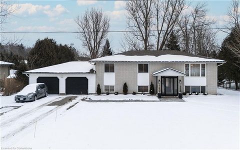 Welcome to your dream home in the heart of Elora! This stunning raised bungalow offers a blend of modern luxury and thoughtful updates that cater to every lifestyle need. The main floor features two spacious bedrooms, open-concept living with a cozy ...