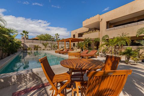 Indulge in the epitome of coastal luxury living with this turn key fully furnished 2 bed 2.5 bath condo in Todos Santos. Crafted with artisan made furniture the residence exudes sophistication and charm. The first floor access seamlessly connects ind...