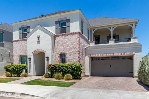 Unbelievably gorgeous semi-custom N/S facing home in a gated boutique enclave and in an amazing location w/in the popular Phoenix Central Corridor. The open kitchen + great room concept has soaring 22ft ceilings, featuring a dream kitchen w/ full sla...