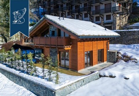 This newly built Alpine chalet for sale in Courmayeur Plan Gorret offers a blend of luxury and modernity in a stunning mountain setting. The 212 sqm detached property features high-quality finishes and precious wood, set in a 200 sqm garden with pano...