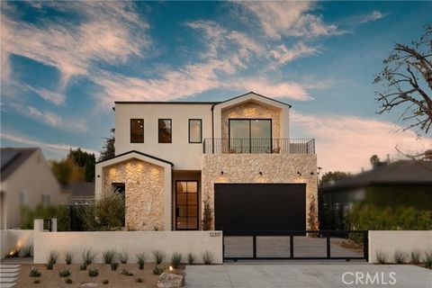 Welcome to 12317 Hatteras St, an exquisite new construction in the heart of Valley Village. This 2025 architectural masterpiece harmoniously blends organic materials with minimalist design to create a warm and inviting space. Situated on a 6,750 sqft...