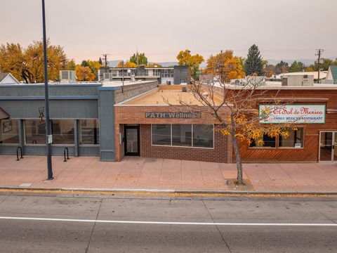 This newly remodeled office building located on Main Street in Lander, Wyoming offers two executive offices, a conference room, and eleven smaller offices. A reception area with a waiting room opens to a central hallway leading to a break room. The f...