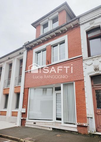 Immeuble comprenant habitation + local commercial + extérieur