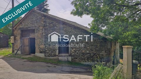 Bâtiment en pierre de en partie rénové