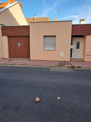 Maison de ville 124 m² avec garage, deux chambres, cave.