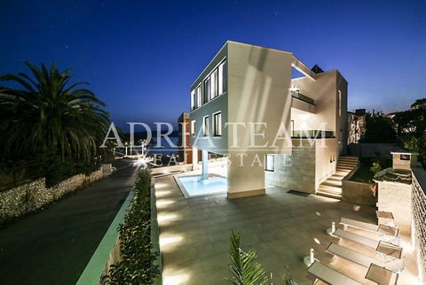 On sale modern luxury equipped Vila in Trogir - Čiovo, 4. row from the sea and beautiful beach in cove. The Vila contains 7 double bedrooms, 8 bathrooms, several terraces, sun loungers and outdoor grill with dining table, gym, sauna, jacuzzi and of c...