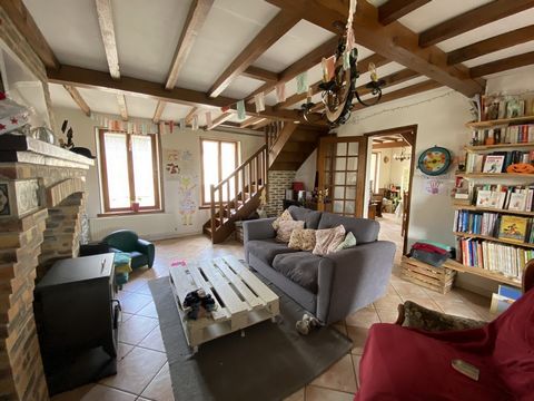 WATREMEZ IMMOBILIER offers you EXCLUSIVELY this pretty country house in a small village near Guise offering on the ground floor: an entrance to living room, a kitchen, a living room with wood fire and exposed beams, a bedroom with magnificent views o...