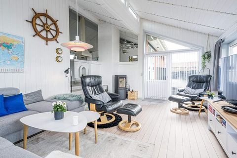 Lovely well-kept cottage located on a natural plot near the North Sea and with a beautiful view of the heath and with Lyngvig Lighthouse on the horizon. The cottage has been modernized in 2013, with a new kitchen and bathroom, and everywhere in the c...