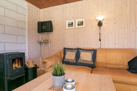 Holiday cottage clad with larch wood located on a secluded natural plot. Good decor with a kitchen and living room with a wood-burning stove for the chilly evenings. Bathroom from 2011. There is a covered terrace.