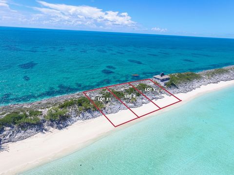 Stunning opportunity to build your very own beachfront oasis in a prime location on an elevated beachfront lot, with breathtaking views. Situated on a generous sized property that extends from sea to sea and boast approximately 100 ft of pristine bea...