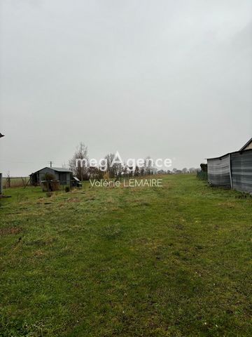 pretty unserviced land of 1809m² for construction project in a quiet village near Albert.