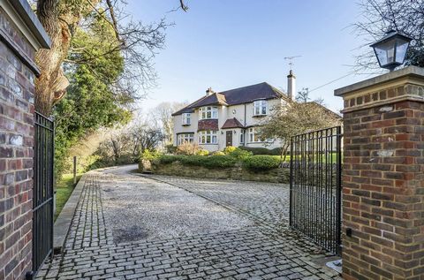 A delightful opportunity to purchase an iconic home set on a secluded plot of 2 acres with auxiliary buildings, separate guest accommodation, a particularly large barn in excess of 1,000 sq ft, garaging, swimming pool, orchard, woodland, formal garde...