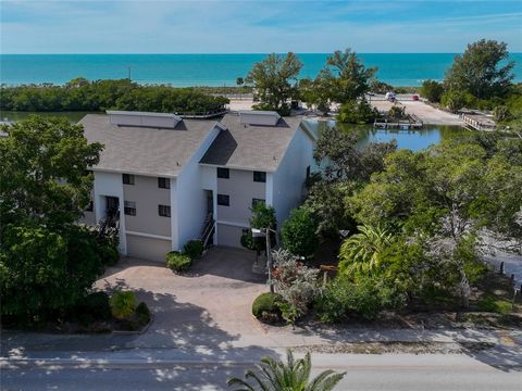 BOATABLE WATERFRONT on SIESTA KEY with NEW dock coming this spring...and seller has ALREADY PAID assessments! This exquisite property, located at the south end of Siesta Key, is nestled is the quiet community of Turtle Cove, which is comprised of onl...