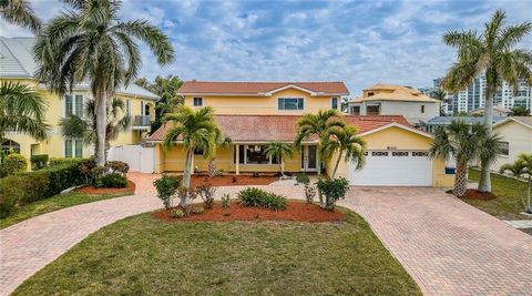 Exceptional waterfront retreat in Treasure Island, FL, where every corner reveals breathtaking views of your private oasis. From the moment you step inside, panoramic vistas welcome you into a world of luxury and tranquility. The primary suite, perch...