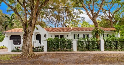 Discover your fairytale dream in this enchanting 3 bed/2 bath home. Step into a world of charm through the captivating courtyard entrance. Marvel at the limestone floors, soaring exposed wood ceilings, and elegant arched details. This fully remodeled...