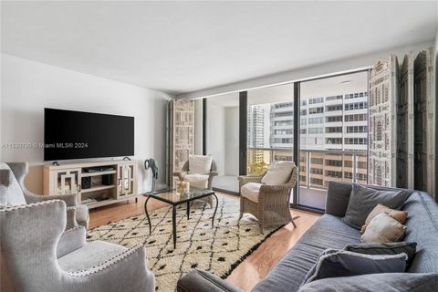 Spacious residence at 9 Island Condo 2 Bed, 2 Baths with an open terrace with views of the city and bay. Features floor-to-ceiling windows providing an abundance of natural light. Kitchen has been renovated. Washer and Dryer in the unit. Enjoy world-...