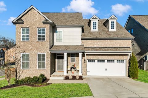 Located on a premium corner in the coveted Donelson Downs subdivision, 2963 Jenry Drive offers many premium upgrades the neighborhood builder made available during construction. This 5-bedroom, 4.5-bathroom home features the primary suite and guest s...