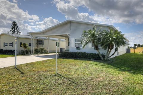 Welcome to a golf lover's paradise at 1211 Barefoot Blvd in Barefoot Bay. This 1900 SF, 2 Bed 2 Bath home offers the perfect blend of comfort & convenience. Lg Island kitchen with RO sys, LG Stainless refrig & dishwasher. Built-in bar lounge, ideal f...