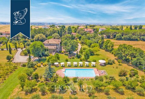 In the splendid Tuscan countryside, near Arezzo, there is this exclusive, finely restored period villa for sale: a luxury relais immersed in the rolling hills of Valdichiana, developed on 3 levels and measuring 1,232 sqm. It is surrounded by almost 6...