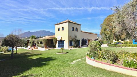 Located only 5 minutes drive to Estepona and 15 to Marbella, within walking distance to the beach this beautiful property boasts Sea and Mountain views amidst a 4000sqm plot. The property consists of a 3 bedroom (2 en-suite) main house with a large l...