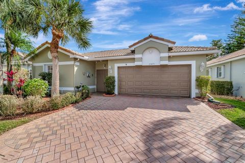 We are excited to showcase this stunning and distinctive single-family home, complete with a guest house, in the exclusive and sought-after adult community of GROVE ISLE. The house boasts an excellent location and accordion shutters for enhanced safe...